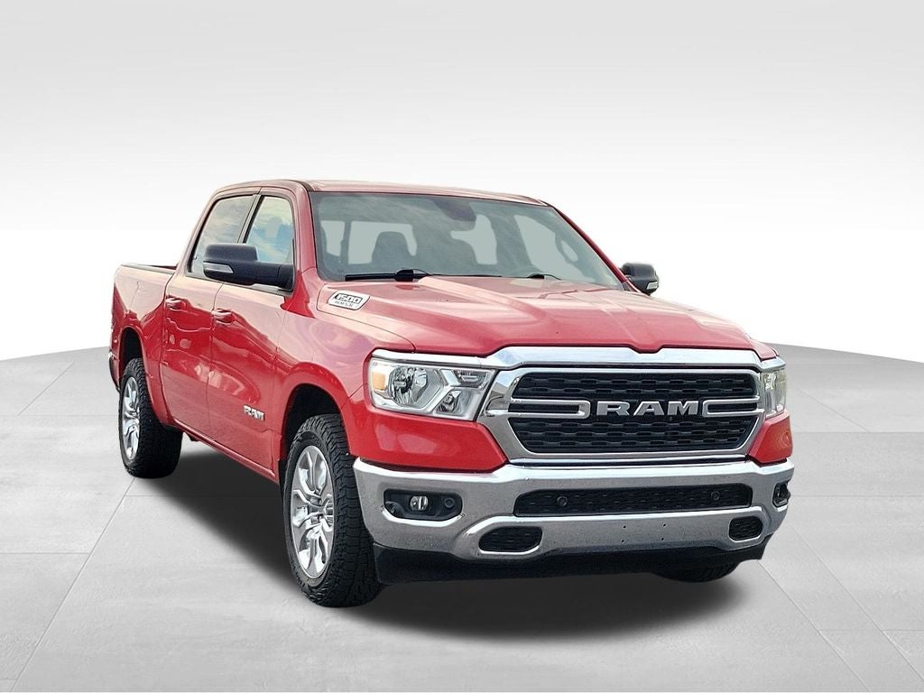 2022 RAM 1500 Big Horn/Lone Star in Flame Red Clearcoat — front three-quarter view