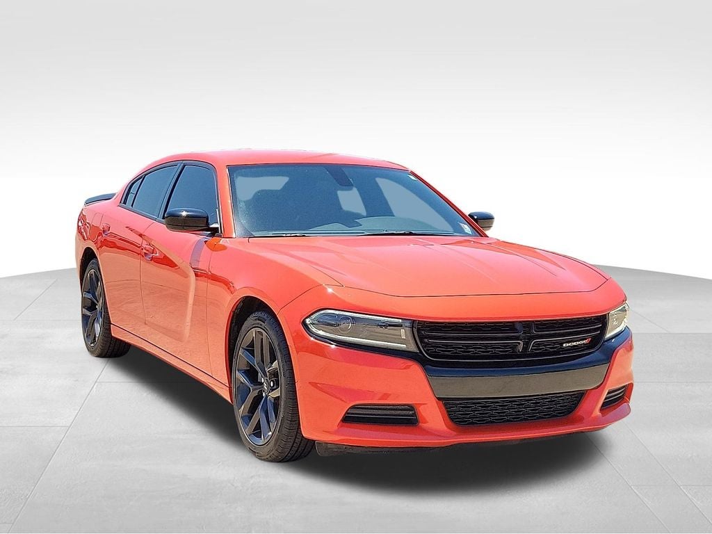 2023 Dodge Charger SXT in Go Mango! — front three-quarter view